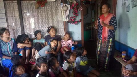 Mrs. Hoiboi (YCPN Active Donor) exhorting children from her own experiences
